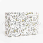 Angled view of a fully assembled custom floral print foldable rigid box.